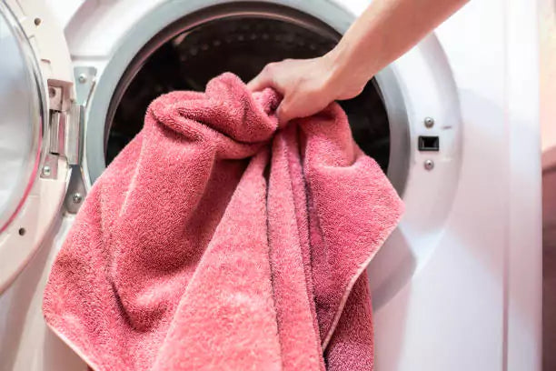 Why You Should Avoid Overloading the Washer with Towels